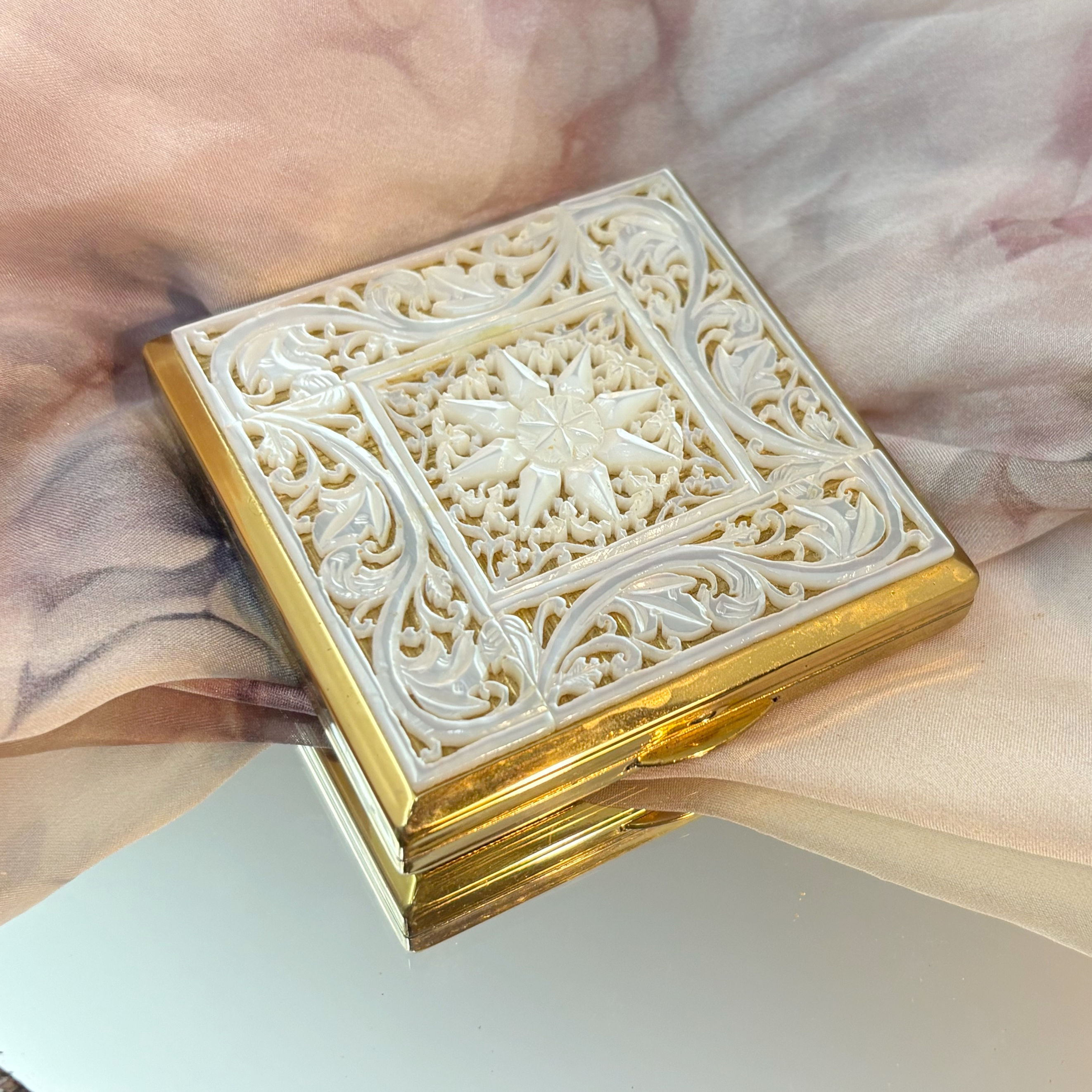 Vintage Mellisa of London carved Mother of Pearl make up powder compact.