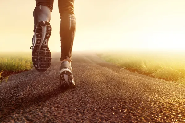 Cross-Country-Runner-on-Road-scaled.webp