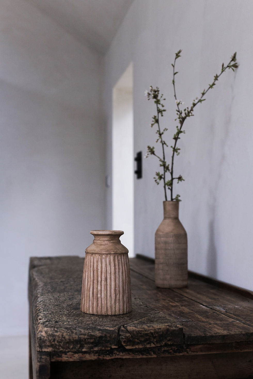 Thumbnail: vase displayed with twigs