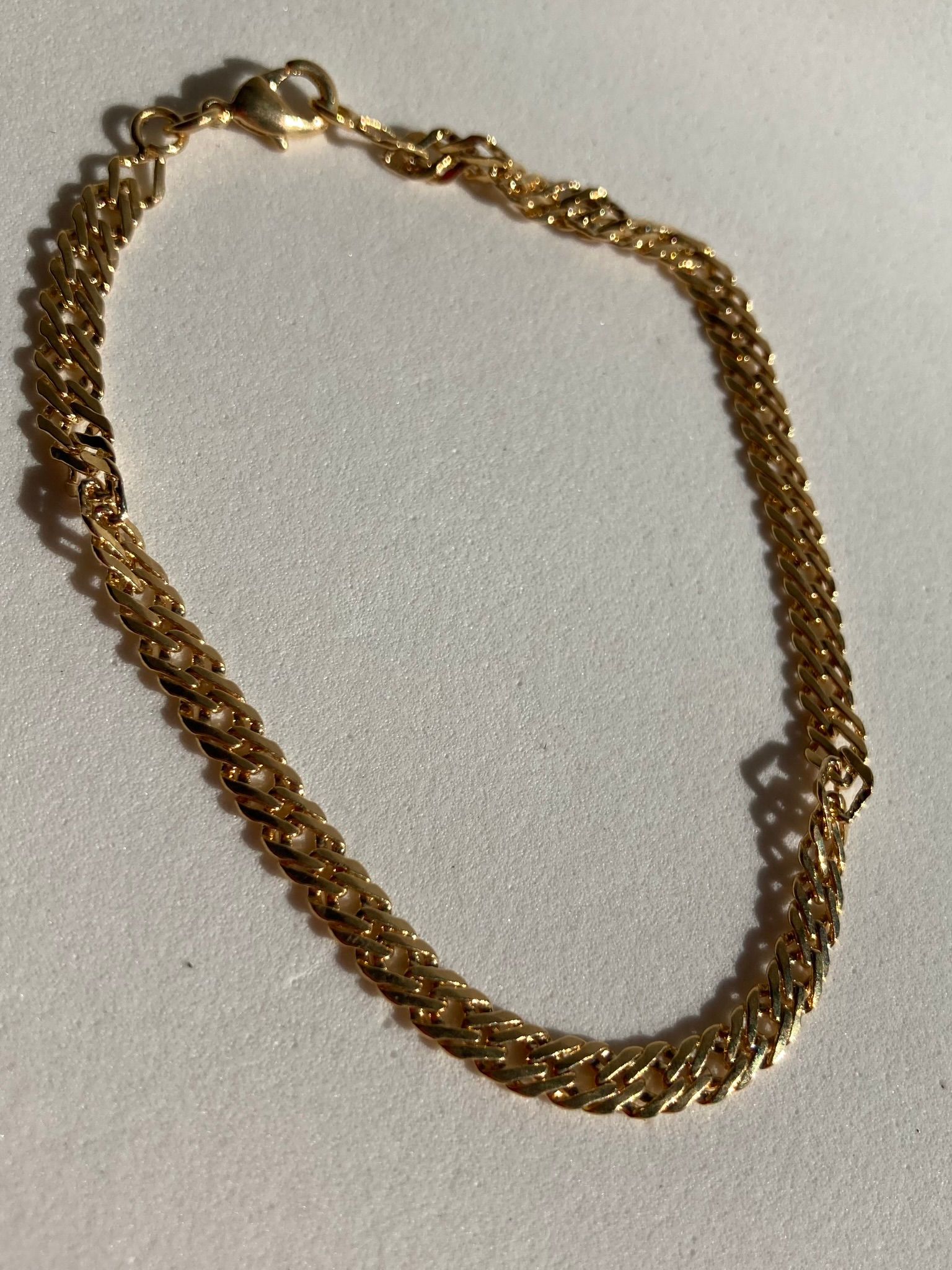 Pulseira com Elo Duplo Trançado Banhado no Ouro 18k