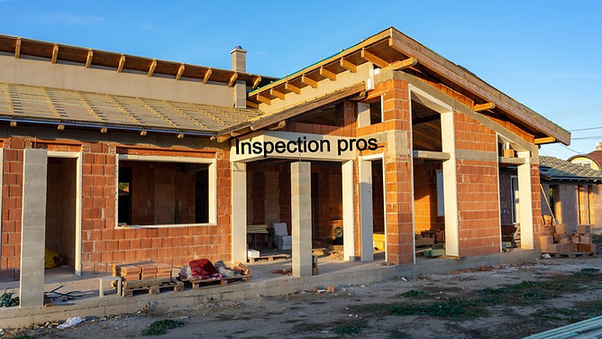 house under constraction with modern brick walls and holes for doors and windows_edited_ed