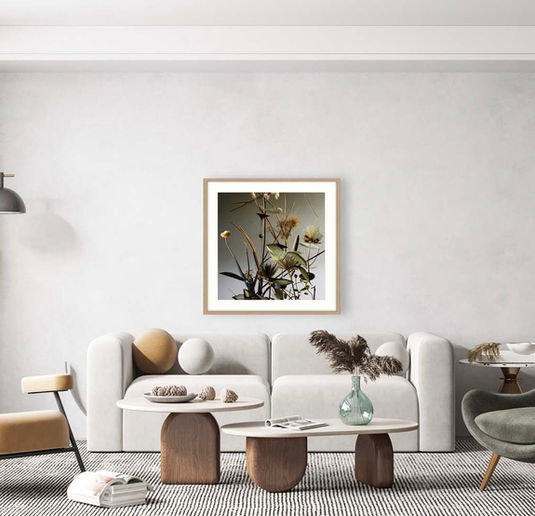 Digital collage from How Does Your Garden Grow by Katherine Boland, blending vibrant plants with burnt timber, showing nature and decay.