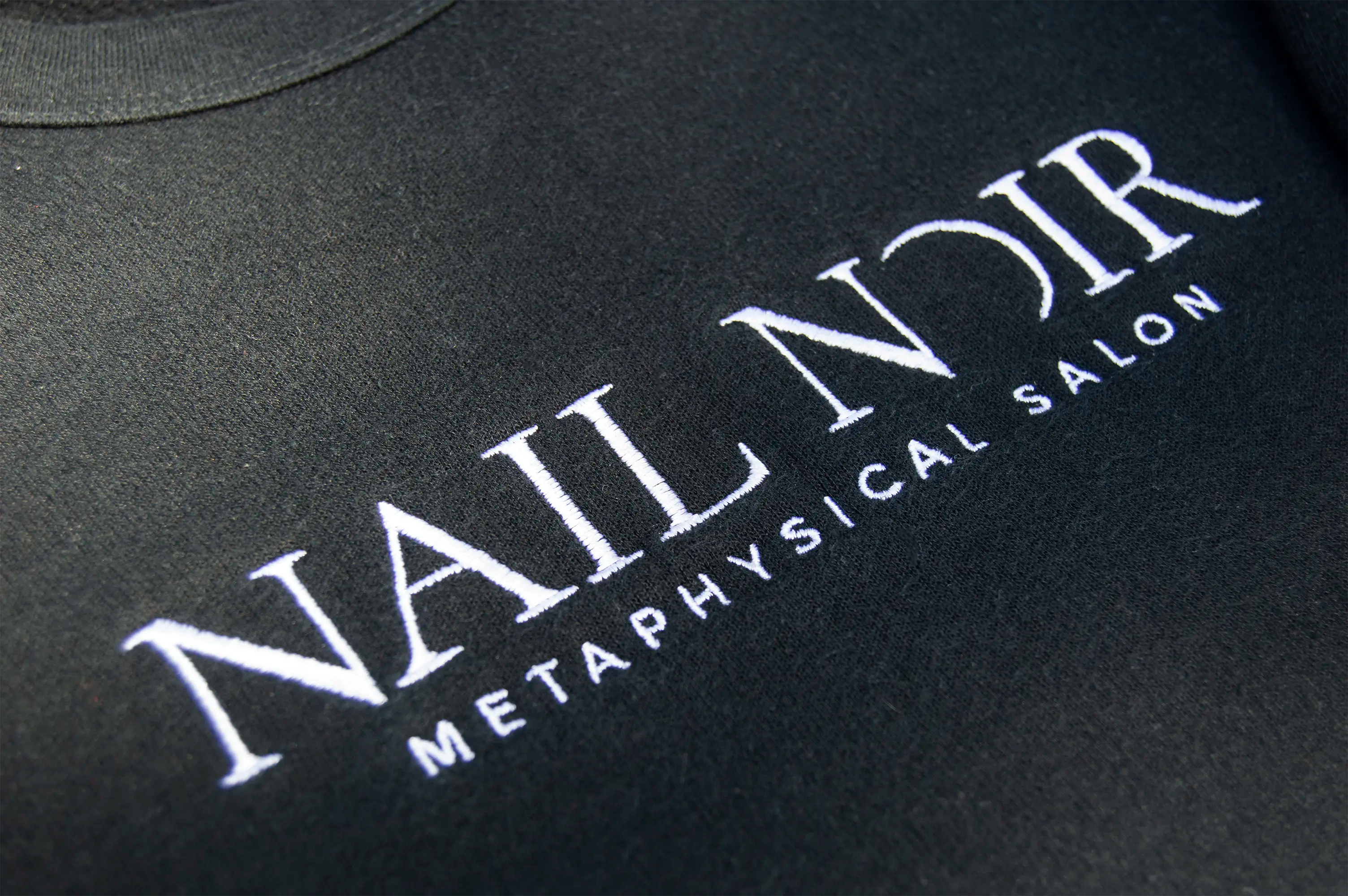 Nail Noir Sweatshirt Closeup.png