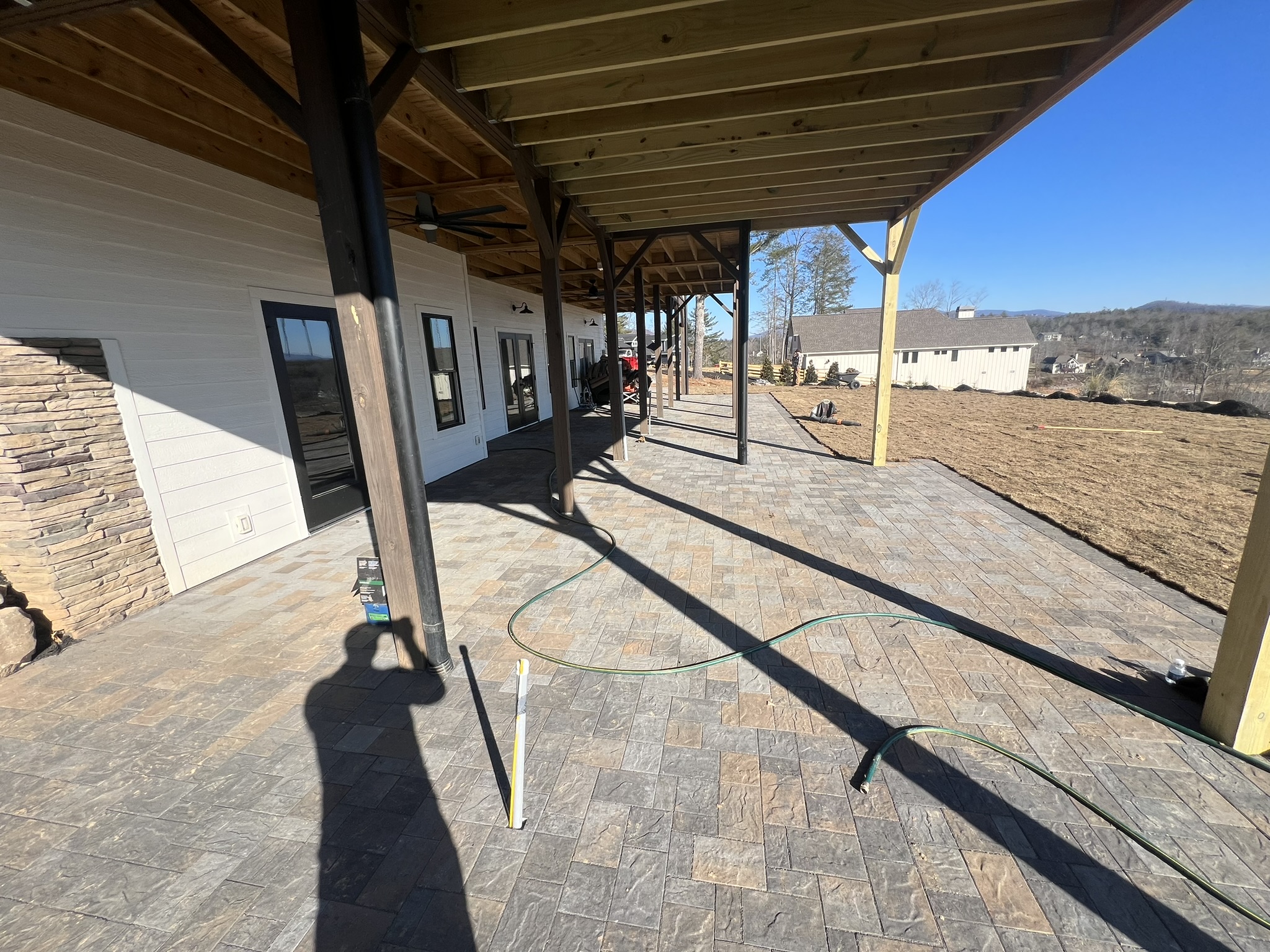 A custom paver patio installed by Dixon Landscape Services