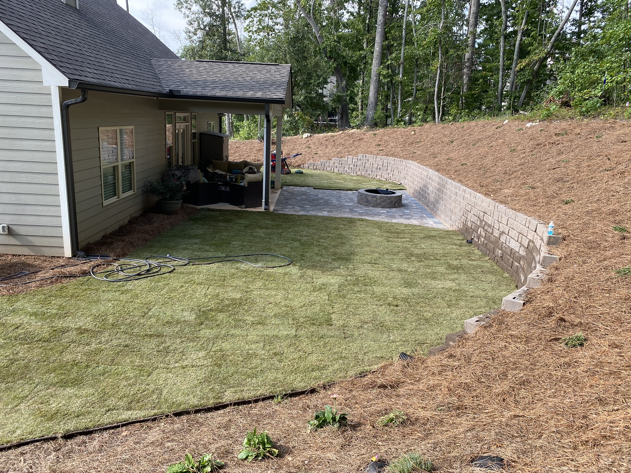A completed retaining wall project by Dixon Landscape Services