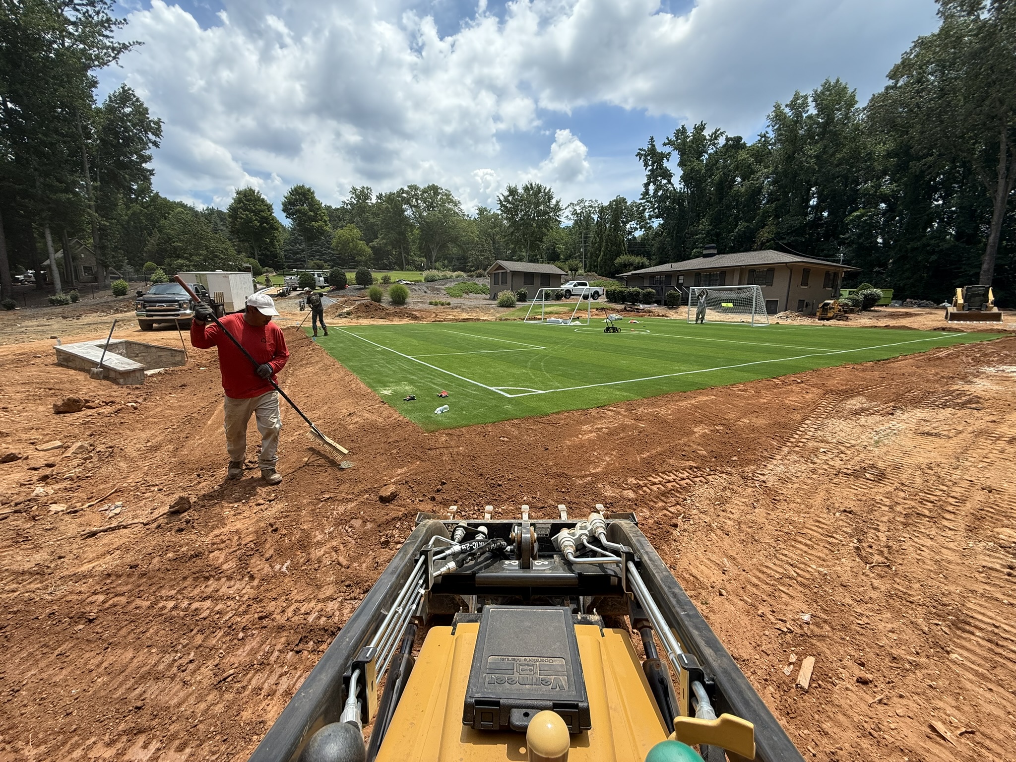 Backyard artificial turf by Dixon Landscape Services