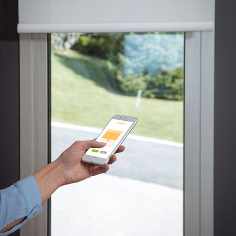 motorised off white roller blind with remote control. Harrogate blinds