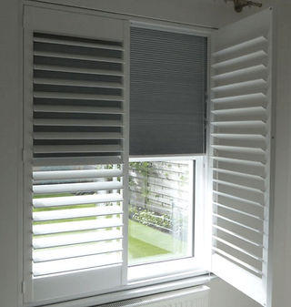 white shutter with grey blockout blind