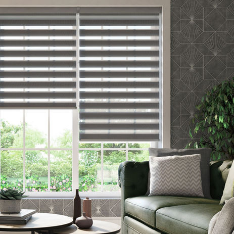 Dark grey Vision (Day to Night) blinds next to each other at adjacent windows. Harrogate blinds