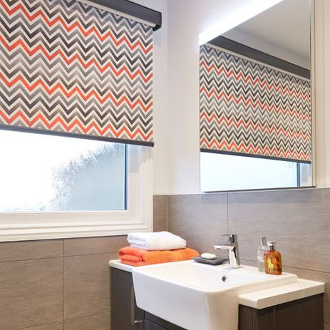 Stripy roller blind with grey cassette header. Harrogate blinds
