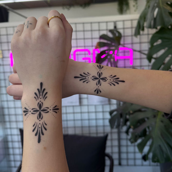 ornamental delicate wrist tattoo in cheltenham