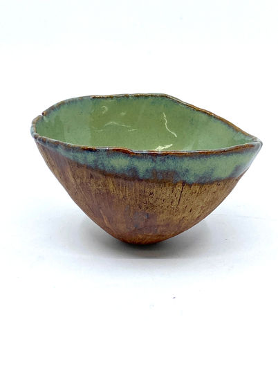 Green over brown pinch pot