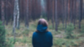 Woman Alone in Forest