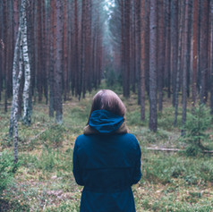 Woman Alone in Forest