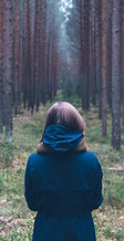 Woman Alone in Forest