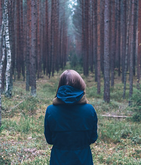 Woman Alone in Forest