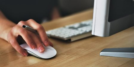 Woman working at computer.