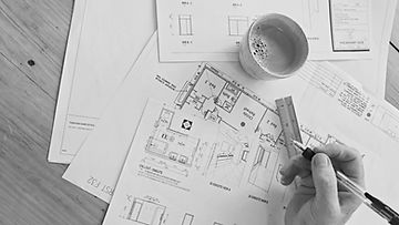 Interior design plans and material selections laid out during the design process.