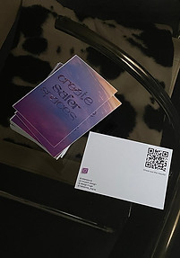 postcards laying on a table.