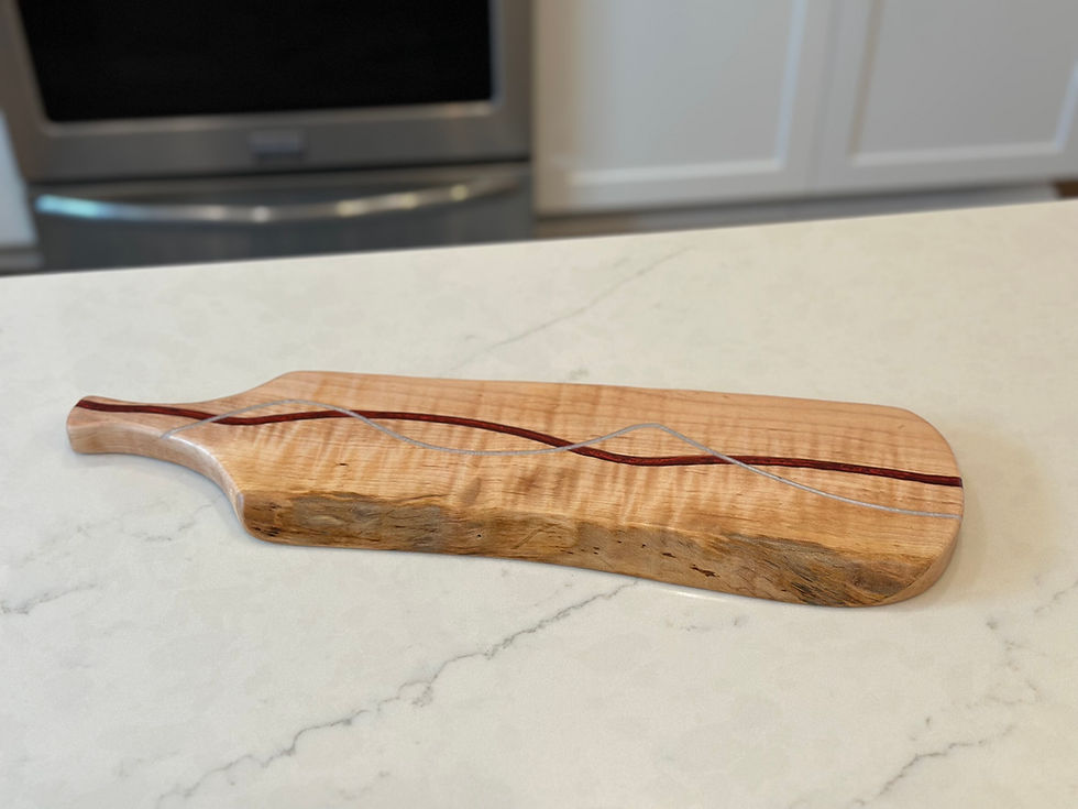 Thumbnail: Cherry live edge bread/charcuterie board with red and grey stripes