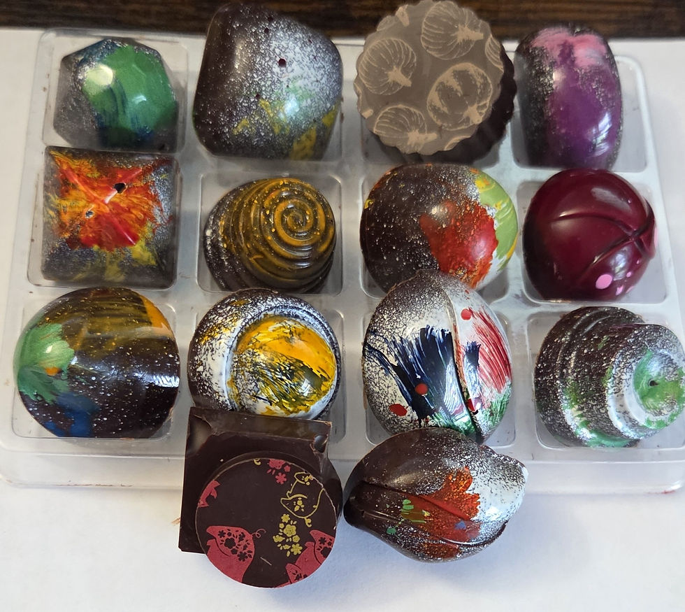 14-piece filled chocolate truffles collection in various colors and shapes