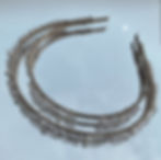 Celeste hair band placed on a mirror