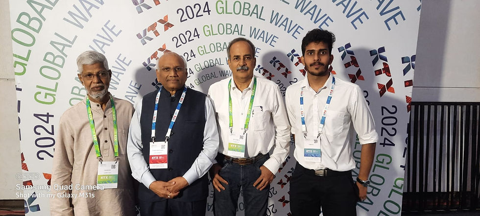 Varun with E K Kutty Sir, K Jayaram Sir, and Dr. Subba Rao Pavluri at the KTX event
