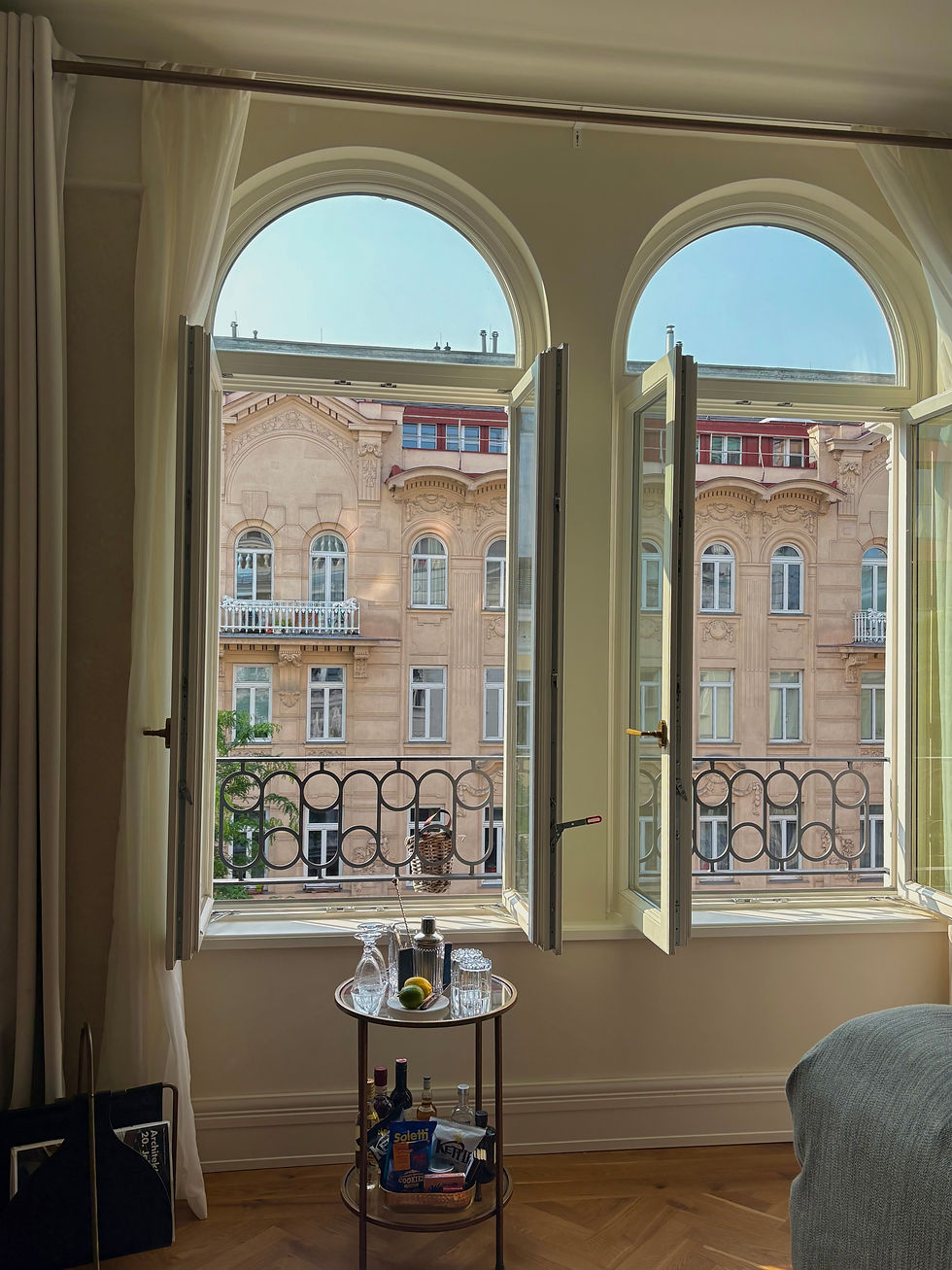 The charming French windows opening up our divine Deluxe Room.