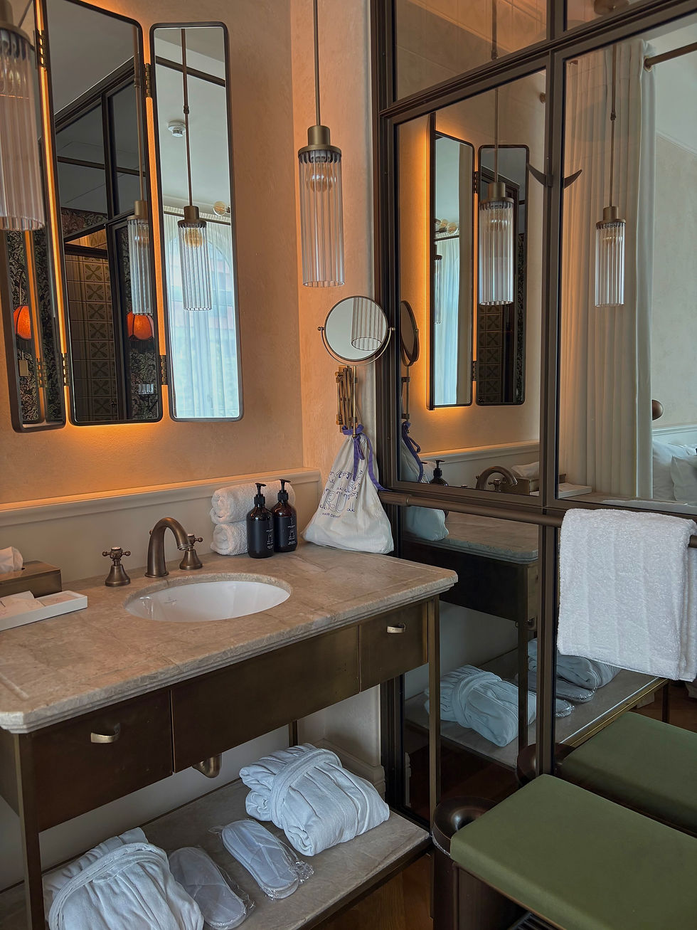 My Deluxe Room vanity area, next to the shower cubicle. A curtain can be drawn to separate the space which is a thoughtful touch.