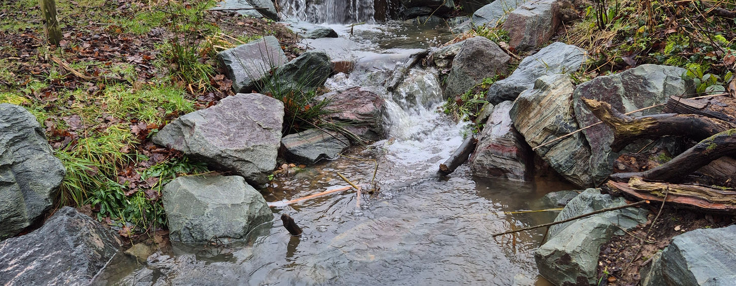 Natural Pond Outflow and Stone Bridge, by WildWater