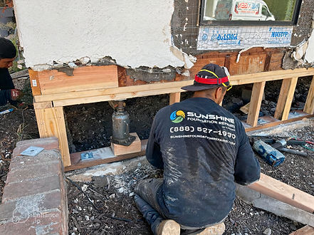 Worker fixing foundation