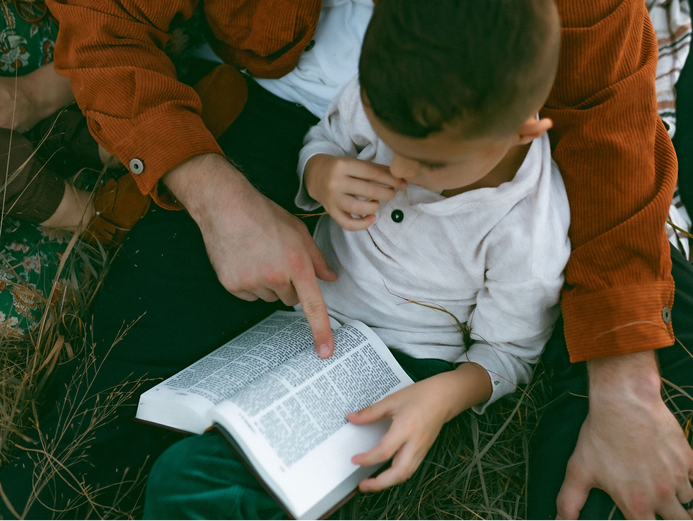 boy reading a bible