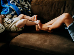 boys playing footsies