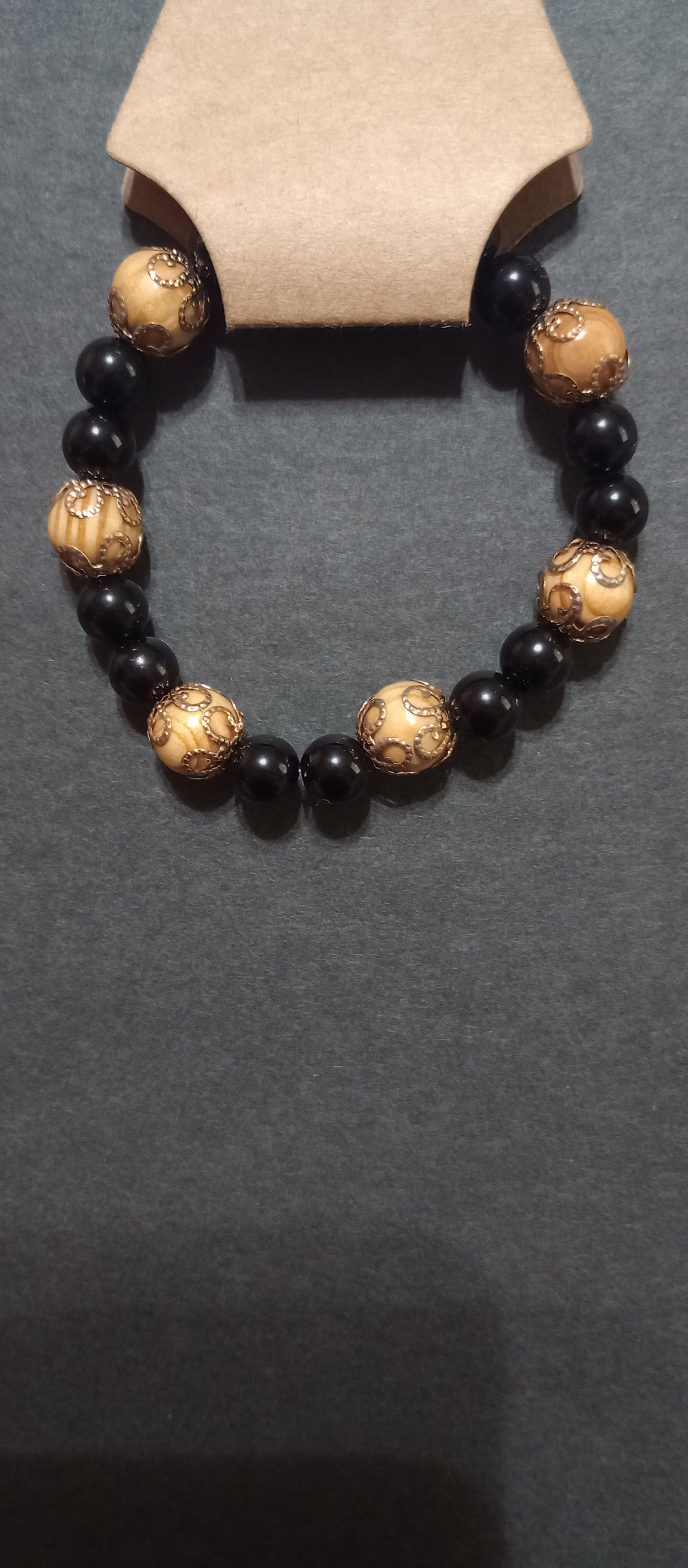 Black Wooden Bead Bracelet with Golden Accents
