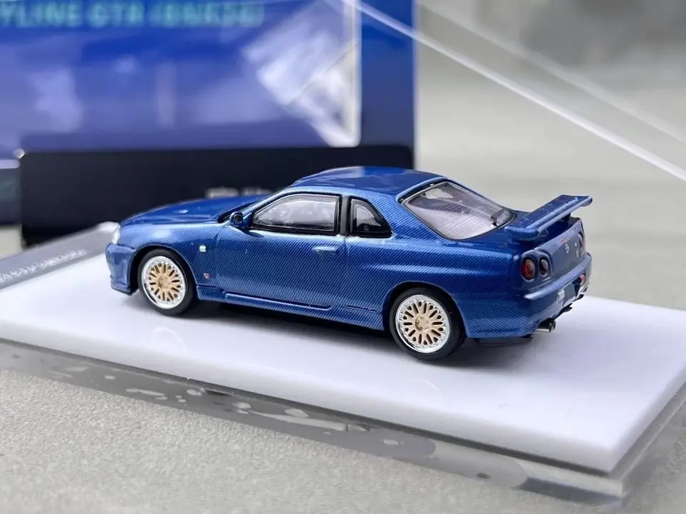 Thumbnail: NISSAN SKYLINE GT-R R34 BLUE FULL CARBON 1/64 DIECAST CAR BY STANCE HUNTERS