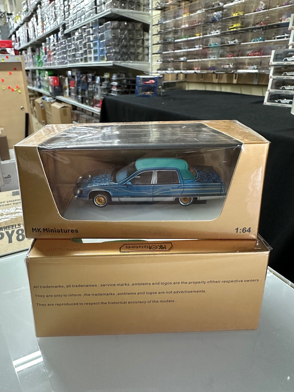Thumbnail: CADILLAC FLEETWOOD LOWRIDER BLUE PIN STRIPES 1/64 DIECAST CAR BY MK MINIATURES