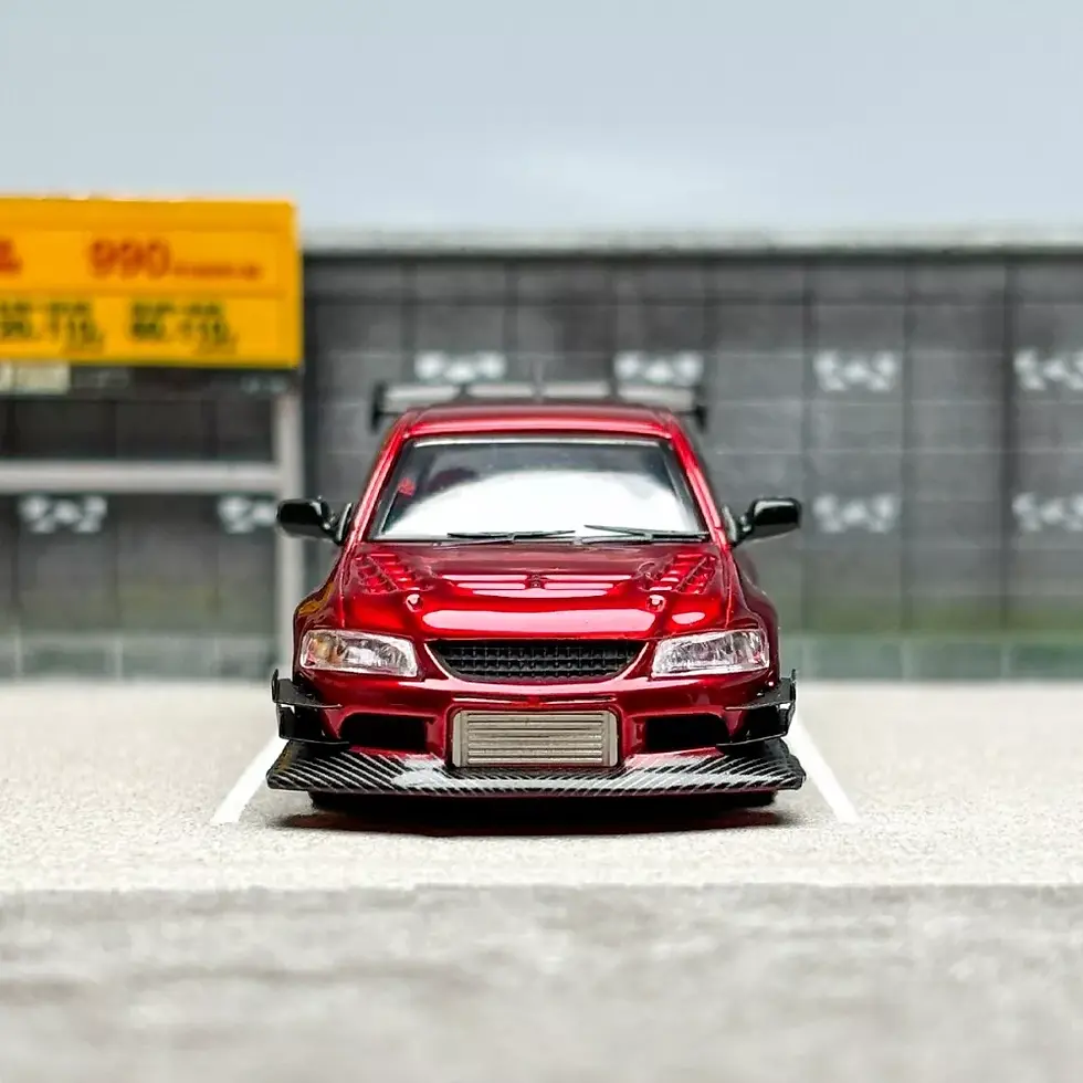 Thumbnail: MITSUBISHI LANCER EVO IX RED WITH EXTRA WHEELS 1/64 DIECAST CAR BY CM MODELS