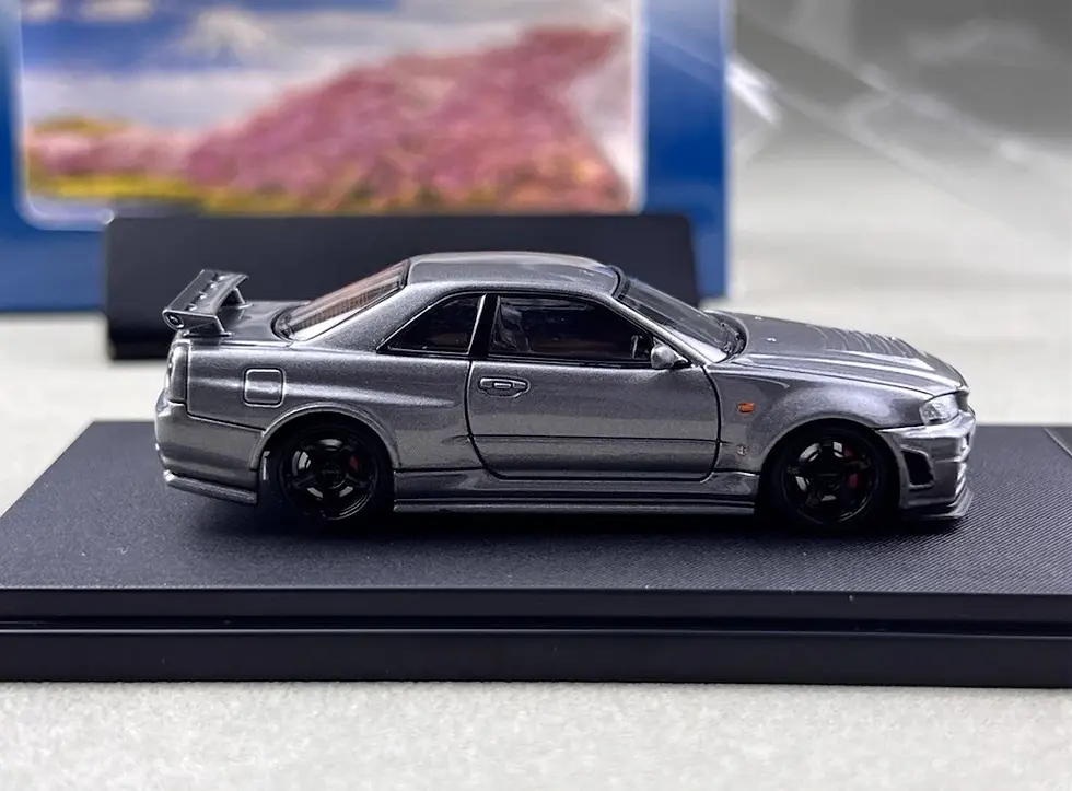 Thumbnail: NISSAN SKYLINE GT-R R34 NISMO Z-TUNE HI END GUN GREY 1/64 DIECAST CAR BY FUJI