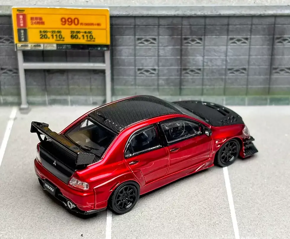 Thumbnail: MITSUBISHI LANCER EVO IX CARBON FIBER RED WITH EXTRA WHEELS 1/64 CAR CM MODELS