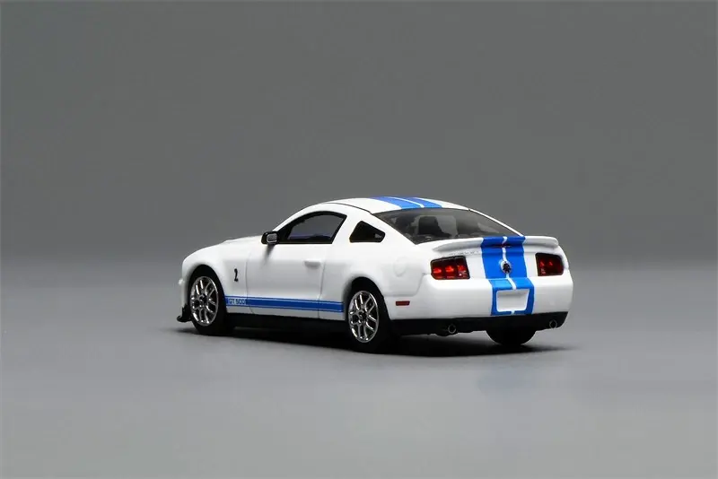 Thumbnail: 2007 FORD MUSTANG SHELBY GT500 WHITE 1/64 DIECAST CAR BY GREENLIGHT MOTOR HELIX