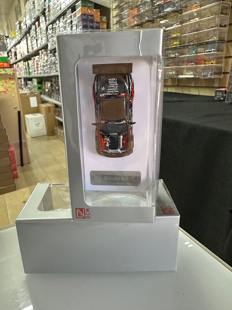 Thumbnail: MAZDA RX-7 BROWN 1/64 SCALE DIECAST CAR MODEL BY DCM MODELS