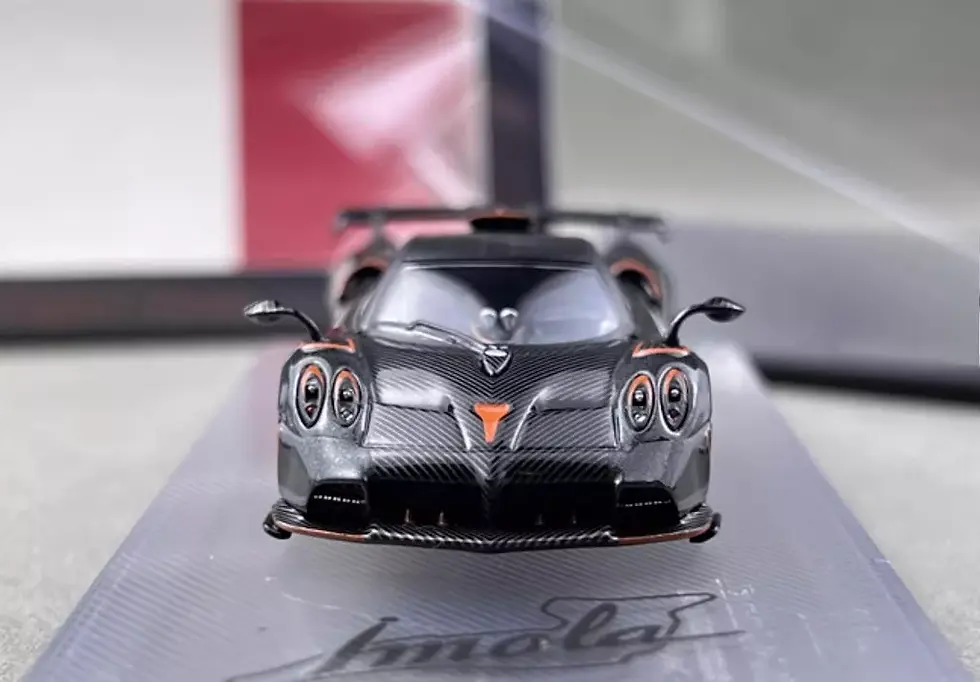 Thumbnail: PAGANI IMOLA METALLIC GRAY WITH EXTRA WHEELS 1/64 DIECAST CAR BY CM MODELS