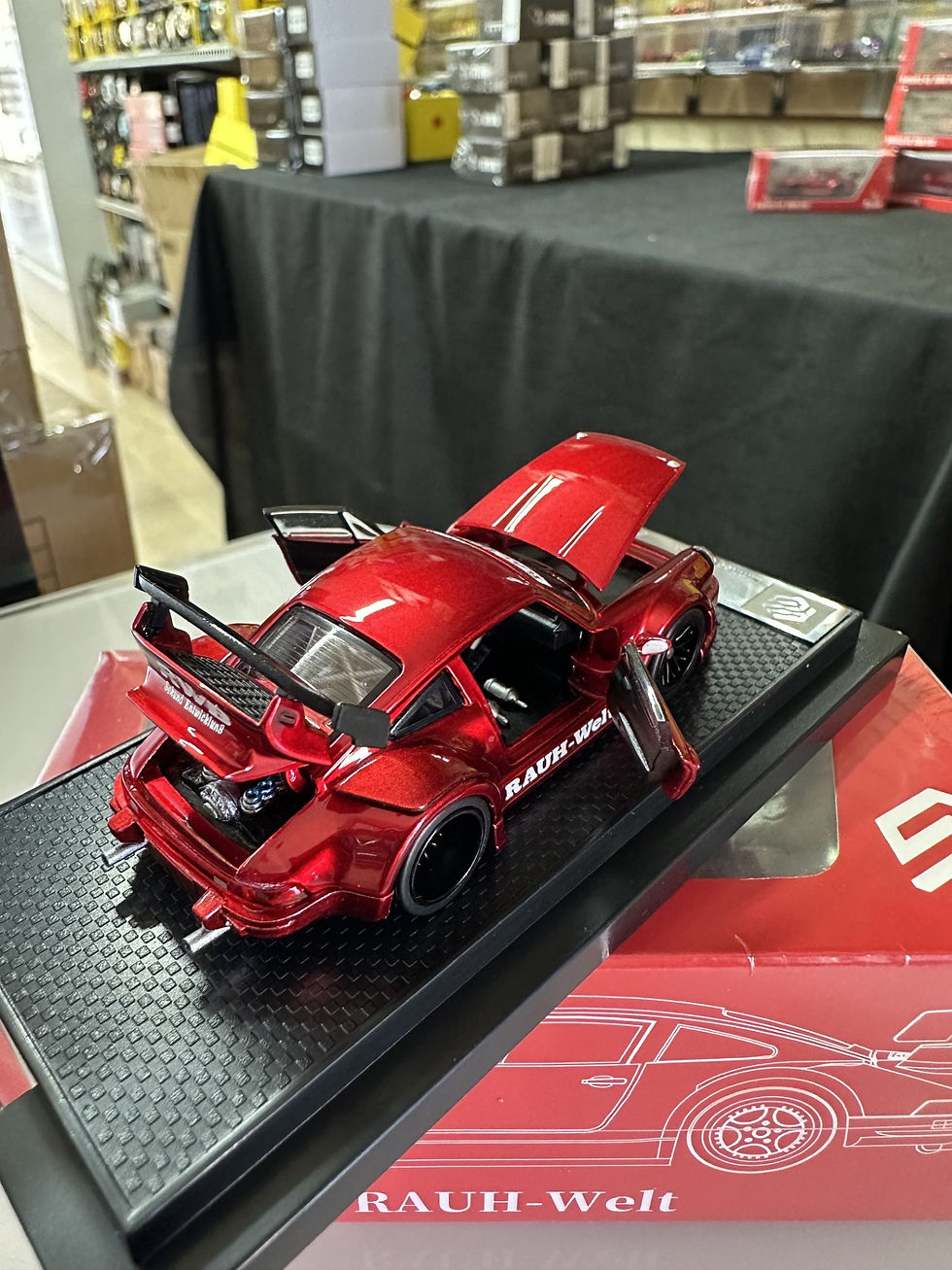 Thumbnail: PORSCHE RWB 930 TRANSPARENT RED FULLY OPENING 1/64 DIECAST CAR BY FG MODEL