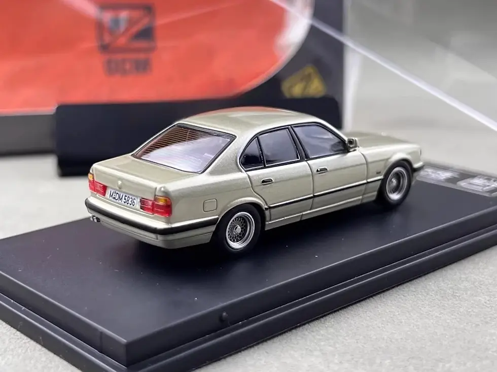 Thumbnail: BMW E32 7 SERIES CASHMERE BEAGLE GOLD 1/64 DIECAST CAR MODEL BY DCM