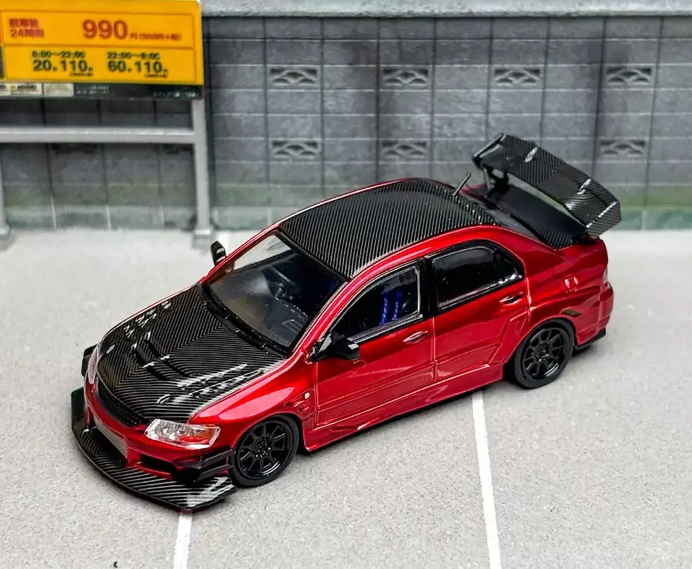 Thumbnail: MITSUBISHI LANCER EVO IX CARBON FIBER RED WITH EXTRA WHEELS 1/64 CAR CM MODELS