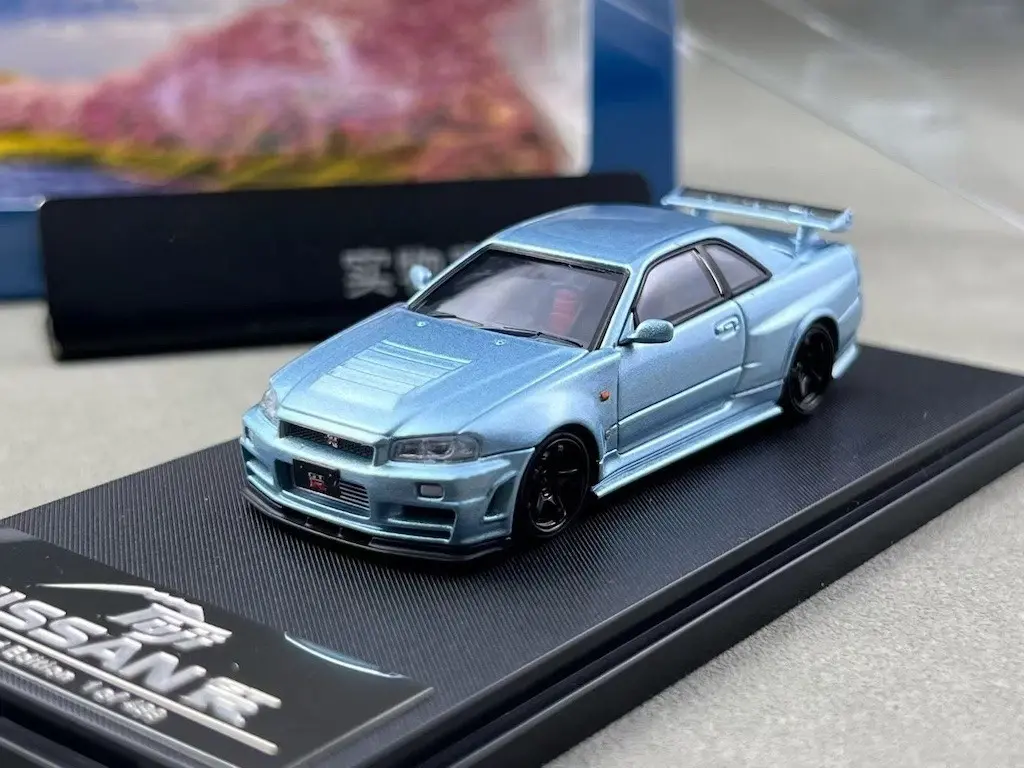 NISSAN SKYLINE GT-R R34 NISMO Z-TUNE HI END ICE BLUE 1/64 DIECAST CAR BY FUJI