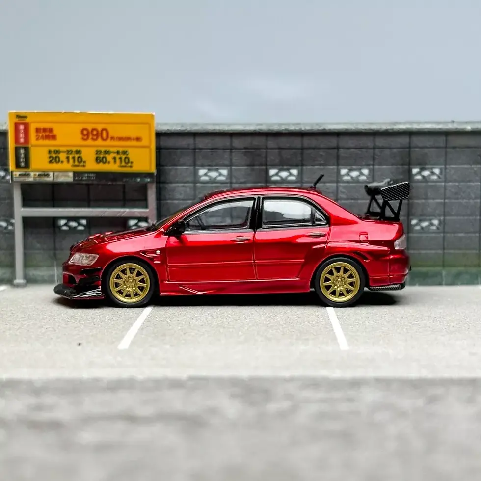 Thumbnail: MITSUBISHI LANCER EVO IX RED WITH EXTRA WHEELS 1/64 DIECAST CAR BY CM MODELS
