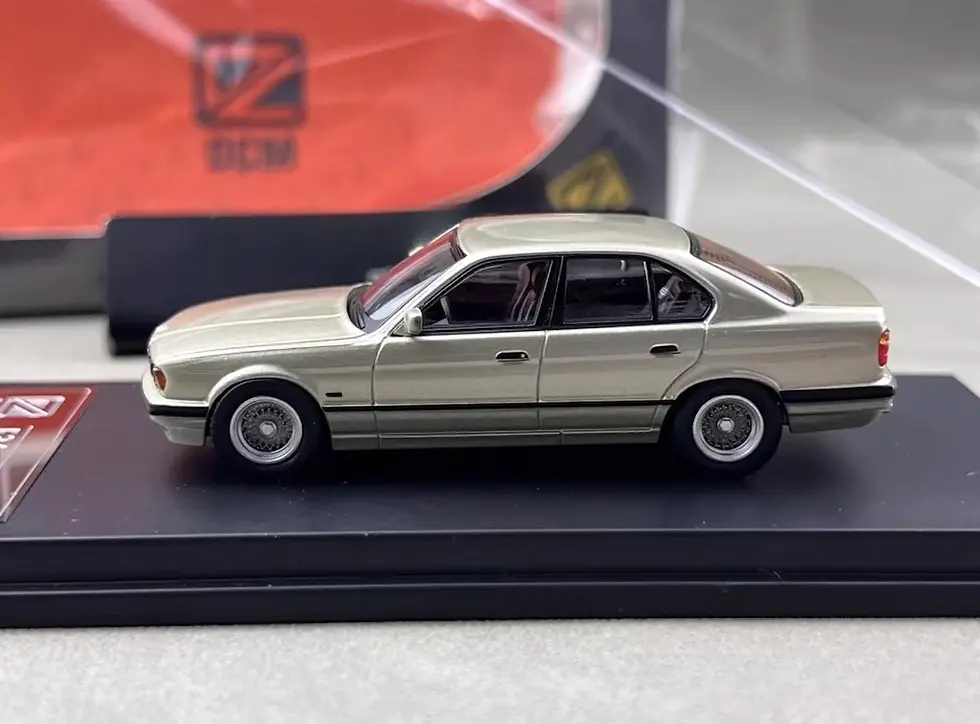 Thumbnail: BMW E32 7 SERIES CASHMERE BEAGLE GOLD 1/64 DIECAST CAR MODEL BY DCM