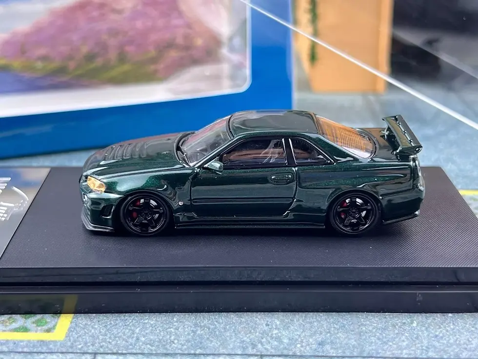 Thumbnail: NISSAN SKYLINE GT-R R34 NISMO Z-TUNE GREEN 1/64 SCALE DIECAST CAR BY FUJI MODELS