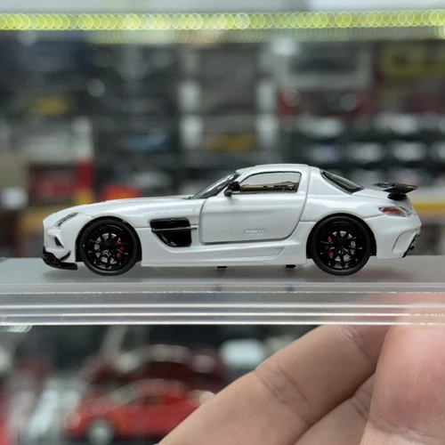 MERCEDES BENZ SLS AMG BS WHITE WITH OPENINGS 1/64 DIECAST CAR BY
